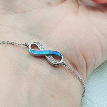 Load image into Gallery viewer, Infinity Blue Fire Opal Bracelet, Sterling Silver