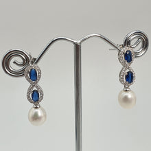 Load image into Gallery viewer, Blue Crystal Infinity &amp; Freshwater Pearl Earrings, Sterling Silver

