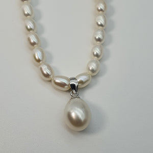 Feshwater Cultured Pearl Strand With Pendant , Sterling Silver Fower Clasp